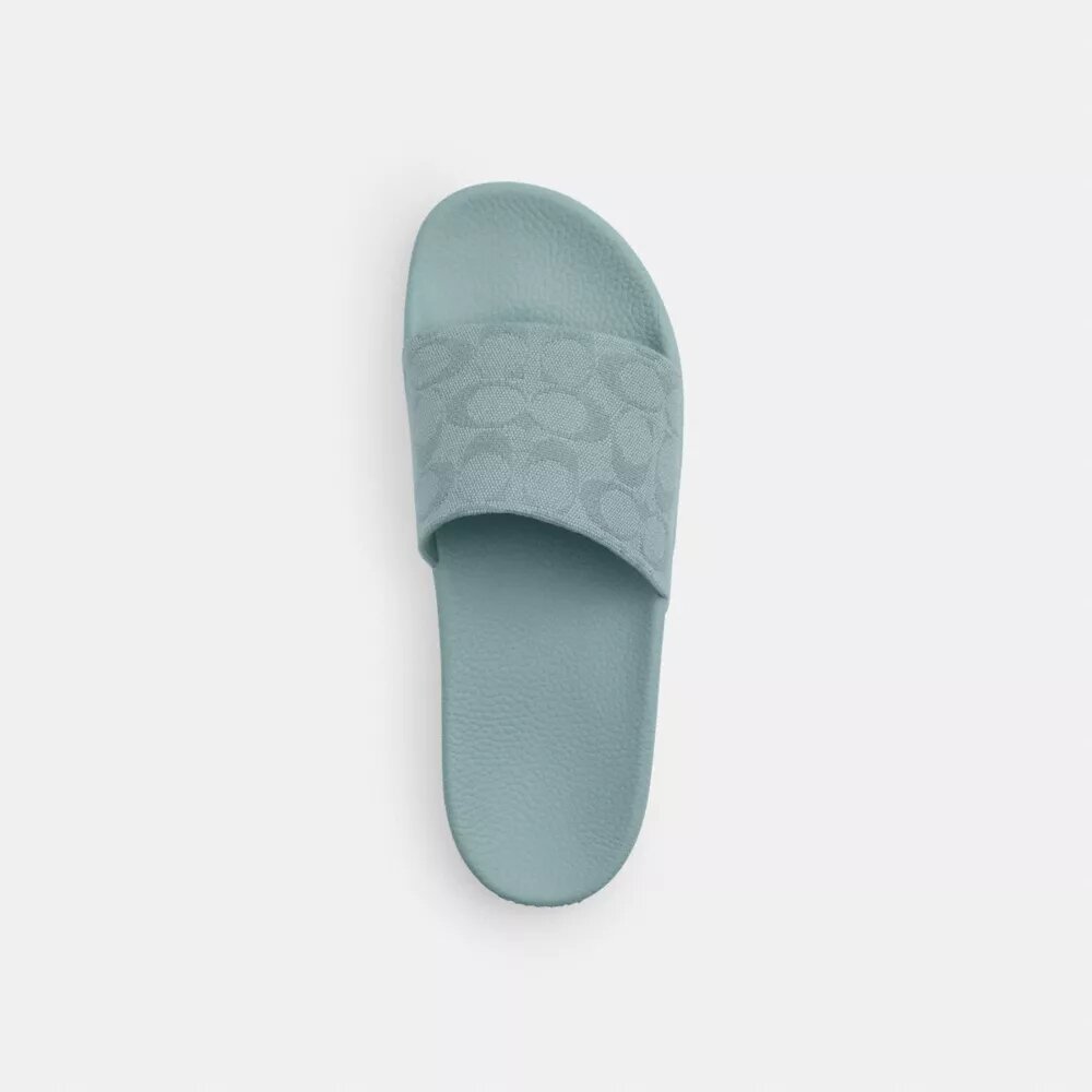 Udele Sport-Pantoletten aus unserem charakteristischen Signature Canvas