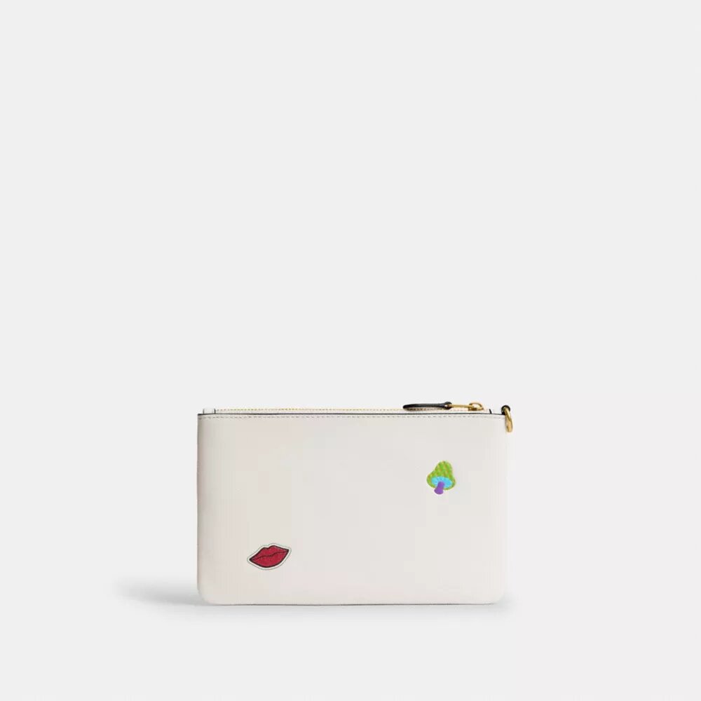 Unverzichtbare kleine Handgelenktasche mit Aufkleber-Print