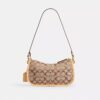 Waverly-Tasche mit zwei Turnlock-Verschlüssen aus unserem charakteristischen Jacquard