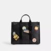 Wesley-Shopper aus Signature Canvas mit Aufnähern