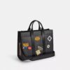 Wesley-Shopper aus Signature Canvas mit Aufnähern