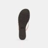 Zehentrenner mit Schleife in Signature-Jacquard